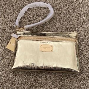 MICHAEL KORS gold wristlet